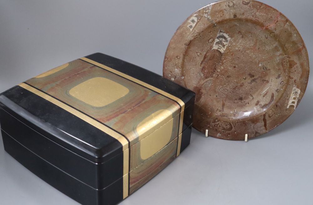 A 20th century Japanese lacquer picnic box and a Belemnite dish